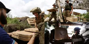 FOTO: Kedai Pizza Ini Berikan Jasa Pengiriman Buat Tentara Perang