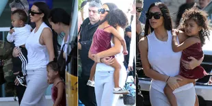FOTO: Kim Kardashian Gendong Baby Saint, North West Malah Nangis