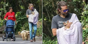 FOTO: Sweet! Jalan Bareng Irina Shayk, Bradley Asyik Gendong Bayi