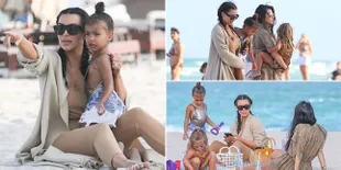 FOTO: Yuk Intip Serunya Liburan Kim Kardashian ke Pantai Miami