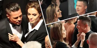 Kemesraan Angelina Jolie - Brad Pitt di Red Carpet BAFTA 2014