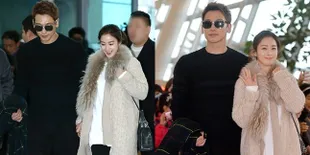 Menuju Bali, Rain & Kim Tae Hee Penuh Senyum dan Gandengan Mesra