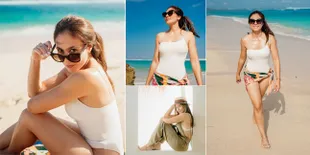 Nikmati Liburan Eksotis di Bali, Intip 8 Potret Wulan Guritno Pose Pakai Swimsuit di Pantai