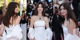 Pakai Gaun Serba Putih, Potret Anne Hathaway yang Dipuji Sangat Cantik di Karpet Merah Cannes 