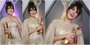 Rambut Cepol Cantik Menggemaskan! Raisa Bawa Piala AMI 2016