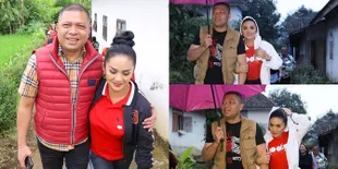 Romantisnya Raul Lemos Temani Krisdayanti Blusukan Meski Hujan