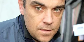 Paranoid, Robbie Williams Tidur Bersama Pistol