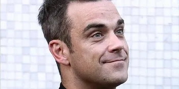 Robbie Williams Calon Pengganti Simon Cowell
