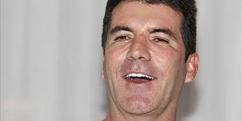 Simon Cowell Serang Balik Elton John