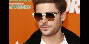 Ups, Zac Efron Jatuhkan Kondom di Red Carpet!