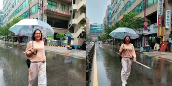 Tampil Flawless, Ini 7 Potret Lydia Kandou di Korea - Vibesnya bak Gadis Pakai Payung Hujan-hujanan