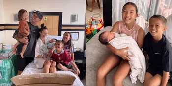 Antusias Sambut Adik, Begini 7 Potret Ketiga Anak Jennifer Bachdim Bareng si Bungsu - Gendong dengan Tulus