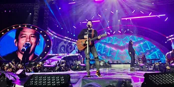 Ariel NOAH Tak Mau Ketinggalan Tiup Terompet Tahun Baru Meski Hujan-Hujanan