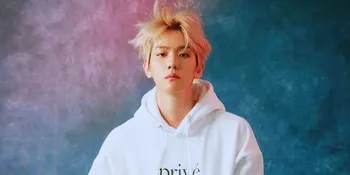 Baekhyun EXO Sendiri ke LA, Rambut Keriting dan Pakai Hoodie yang Didesainnya