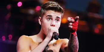 Dukung Chris Brown, Justin Bieber Bikin Grafiti