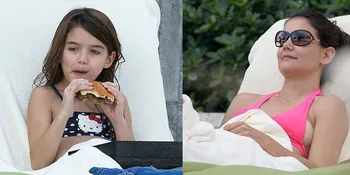 [Foto] Liburan, Katie Holmes - Suri Cruise Berjemur di Pantai