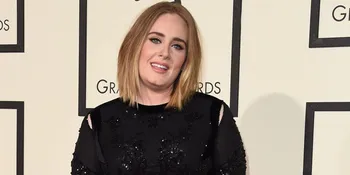 FOTO: Tampil Beda, Adele Umbar Bagian Pribadi di BRIT Awards 2016