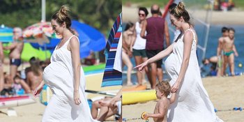 Hamil Besar, Candice Swanepoel Pamer Baby Bump Sambil Main Dengan Anak di Brazil