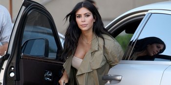 Jalan Bareng Bayi, Kim Kardashian Sembunyikan Wajah Saint West