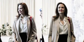 Kenakan Kaftan Putih, Angelina Jolie Ajak Vivienne Berbelanja Santai