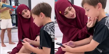 Potret Cantiknya Celine Evangelista Berhijab Merah, Gantengnya Lucio Ikut Bikin Salah Fokus