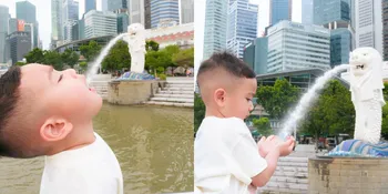 Potret Rayyanza Berpose Lucu di Depan Patung Merlion, Netizen: Wudhu Aja Nyampe Singapore