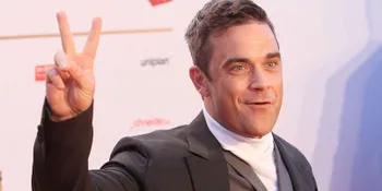 Robbie Williams: Aku Suruh Tukang Pos Dengarkan Albumku