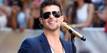 Robin Thicke Memohon Agar Istrinya Tetap Bersamanya