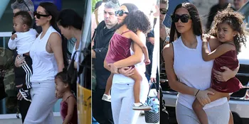 FOTO: Kim Kardashian Gendong Baby Saint, North West Malah Nangis