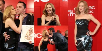 Kylie Minogue Cium Mesra Fans Saat Rilis Album di Perancis