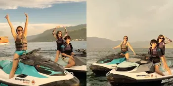 Momen Seru Wulan Guritno Ajak Anak Liburan, Main Jetski Sambil Nikmati Keindahan Danau Toba