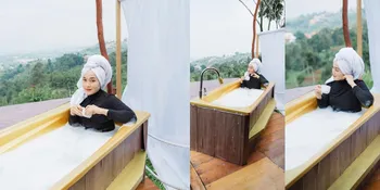Potret Ririe Fairus Berendam di Luar Ruangan dan Ganti Hijab dengan Handuk, Panen Pujian Netizen