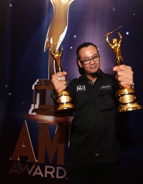 Agung Hellfrog sabet dua penghargaan AMI Awards 2015 © KapanLagi.com®/Budy Santoso