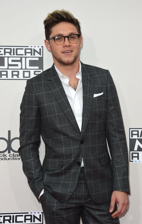 Niall Horan tak ingin meminta opini soal musik yang ia buat pada orangtuanya © AFP