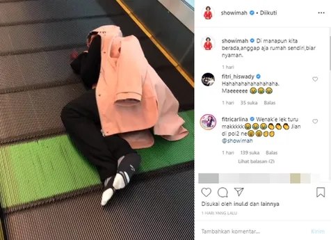 Tidur di Eskalator
