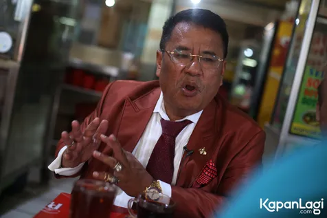 Masih Tersangka