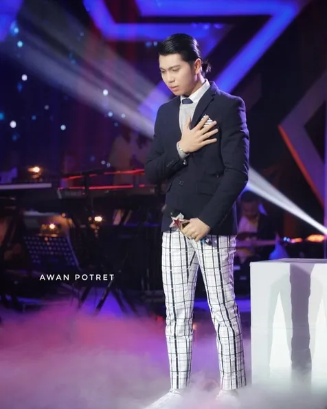 Pujian Melly Goeslaw