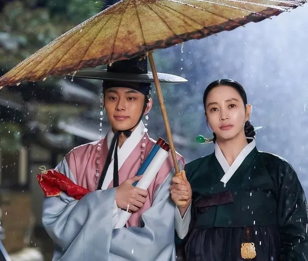 UNDER THE QUEEN'S UMBRELLA