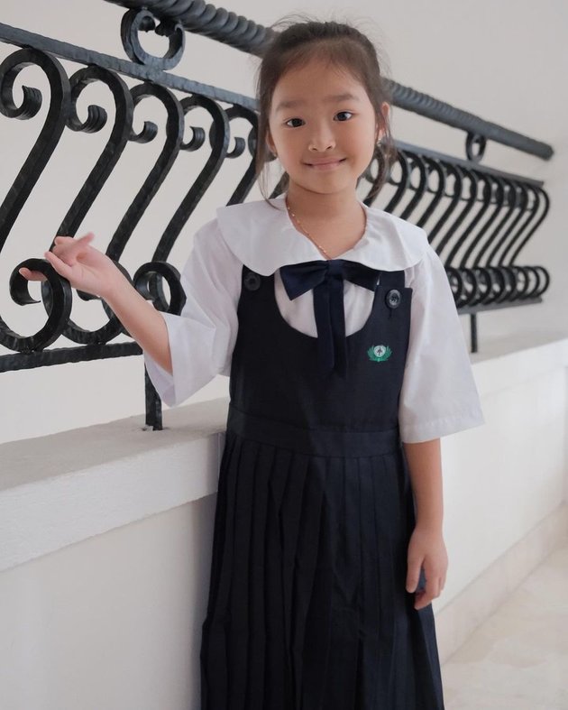 6 Portraits of Betrand Peto who is now a high school student and Thalia entering elementary school, wearing school uniforms at home - accompanied by Sarwendah