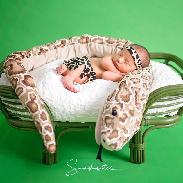 6 Latest Photos of Air Rumi, Ammar Zoni's Son, Looking Adorably Like a Little Tarzan - Sleeping with a Snake Doll