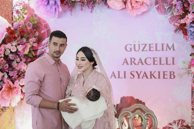 7 Portraits of Baby Guzel, Margin Wieheerm and Ali Syakieb's Child, at the Akikah Celebration, as Beautiful as Her Mother - Like a Porcelain Doll Wearing a Pink Dress
