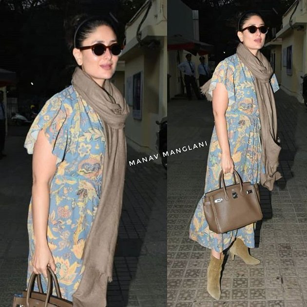 Kareena Kapoor memilih dress bernuansa krim yang dipadukan dengan tas Hermes berwarna senada dengan baju dan syalnya. Ia tampil keren begini kala nonton film di bioskop belum lama ini.