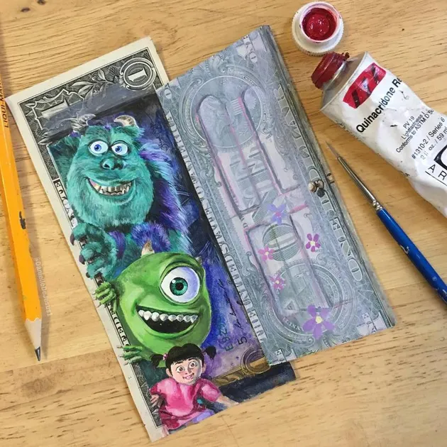 Lukisan tokoh kartun di uang 1 dollar