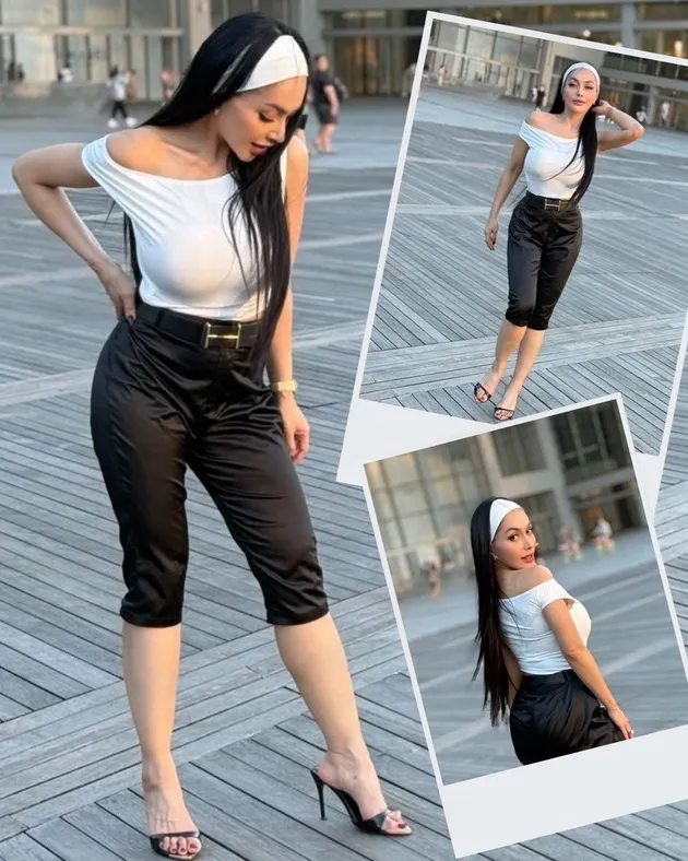 Denada pakai outfit hitam dan putih