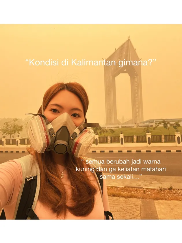 煙害で空が黄色くかすむカリマンタンの街を背景に、防じんマスクを着けたErika Richardo