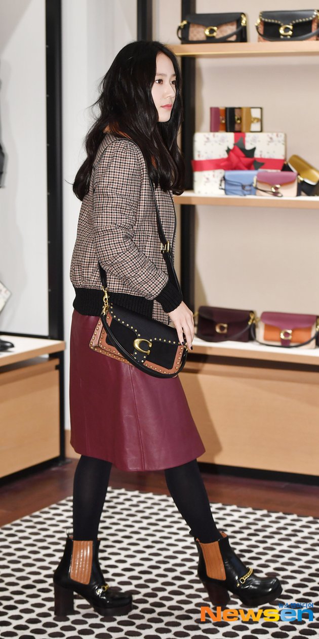 Krystal's Fashion at COACH Event, Her Hair is Slightly Wavy