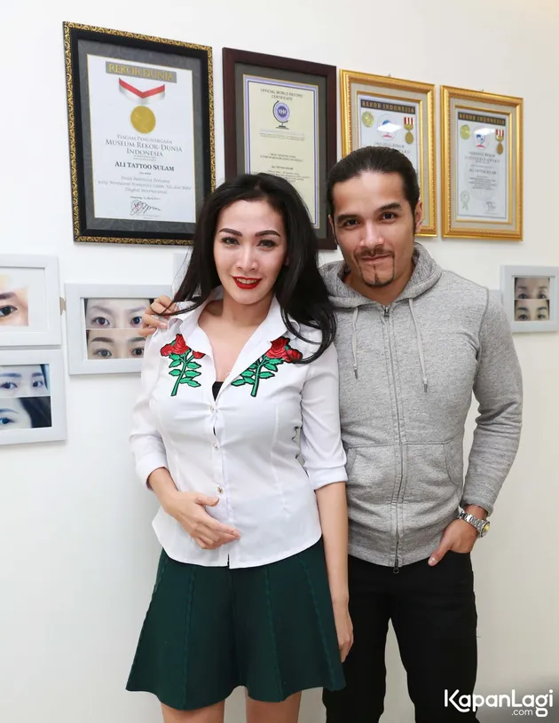 Romy Rafael dan Istri