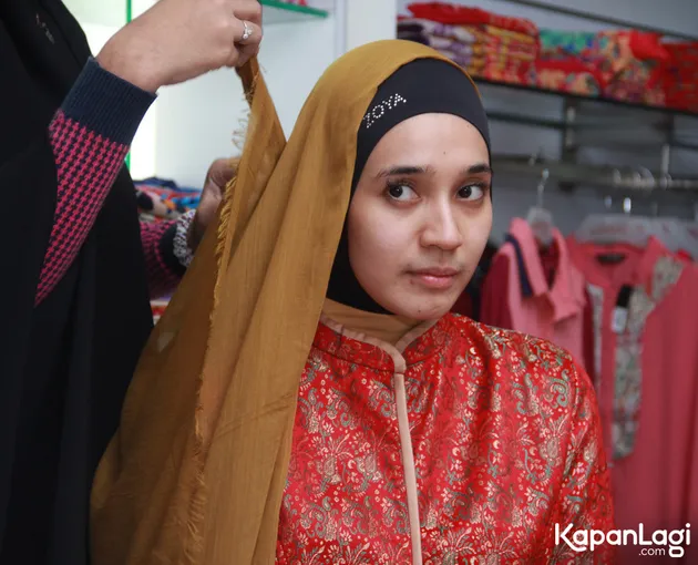 Dhini Aminarti