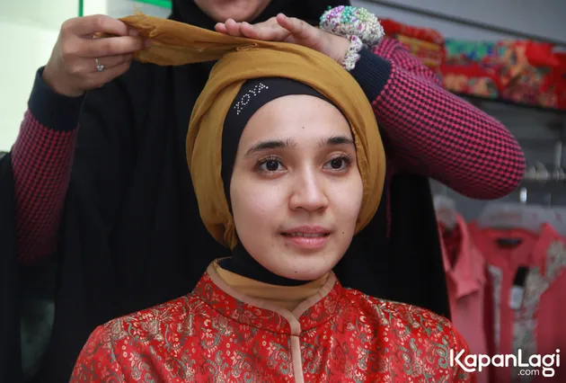 Dhini Aminarti