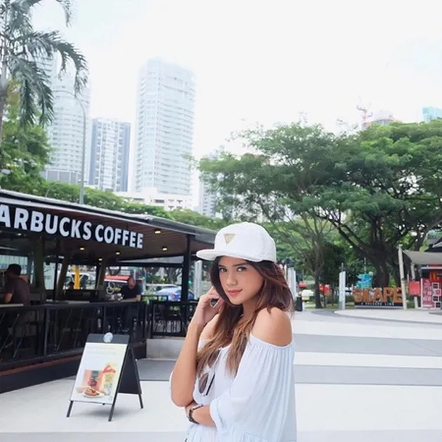 Audi Marissa ke Singapura
